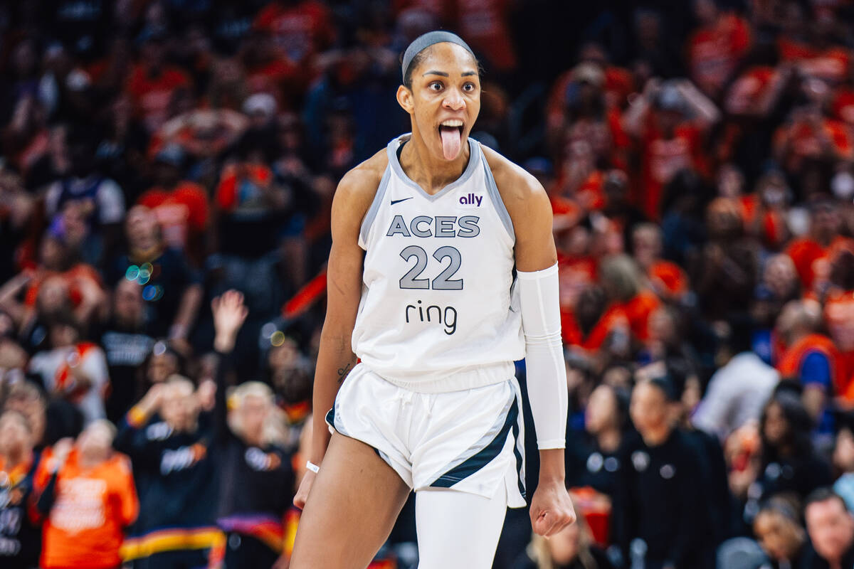 Aces center A'ja Wilson (22) reacts after making a shot during the final seconds of game t ...