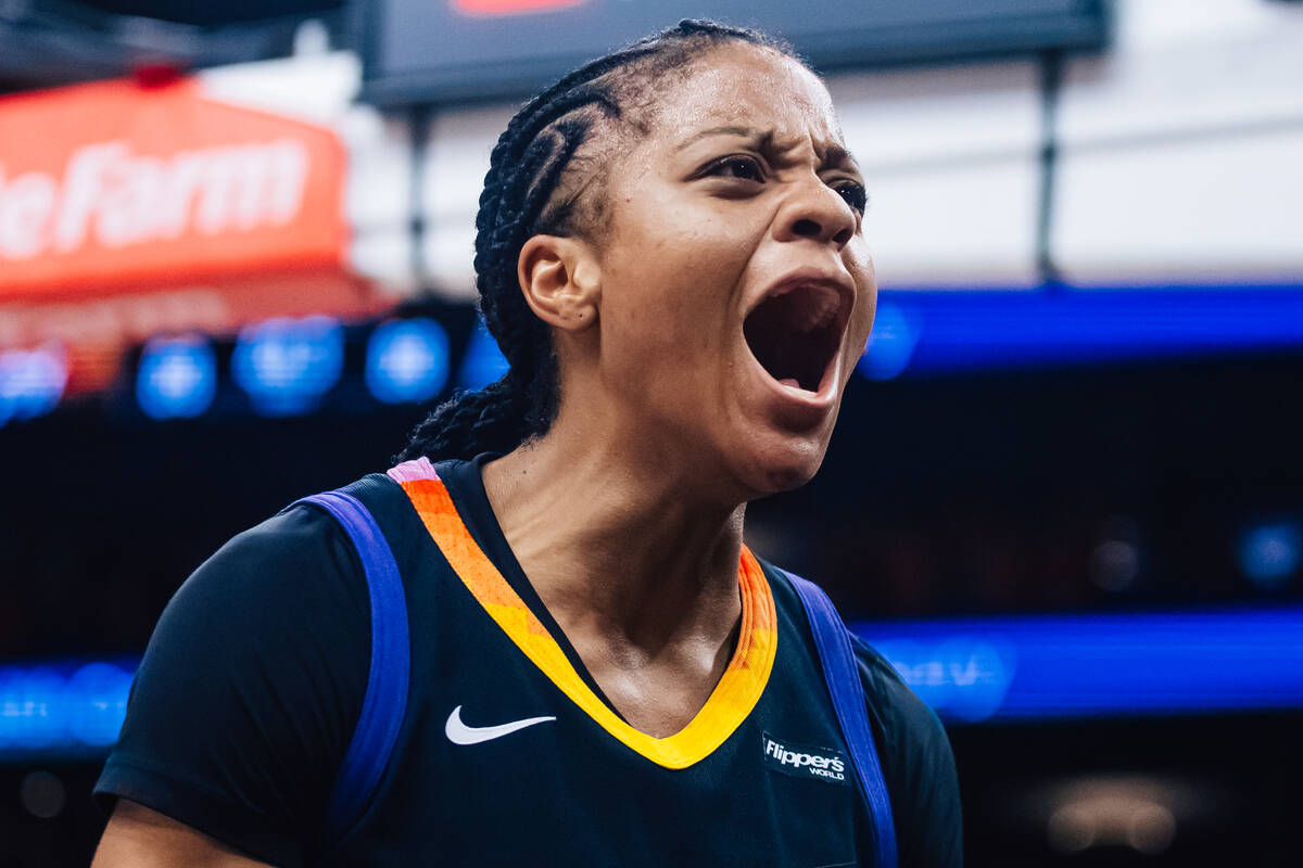 Phoenix Mercury guard Monique Akoa Makani (8) yells to pump up the crowd after Aces center A&#0 ...
