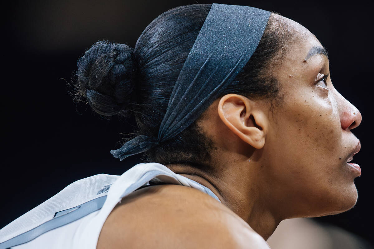 Aces center A'ja Wilson (22) watches a free throw during game three of a WNBA finals match ...