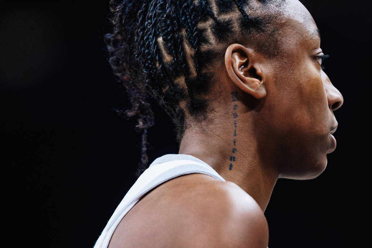 Aces guard Jewell Loyd’s neck tattoo during game three of a WNBA finals match up between ...