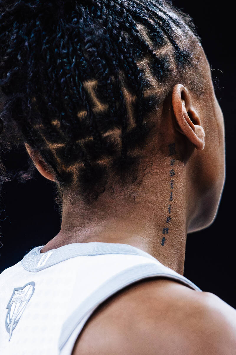 Aces guard Jewell Loyd’s neck tattoo during game three of a WNBA finals match up between ...
