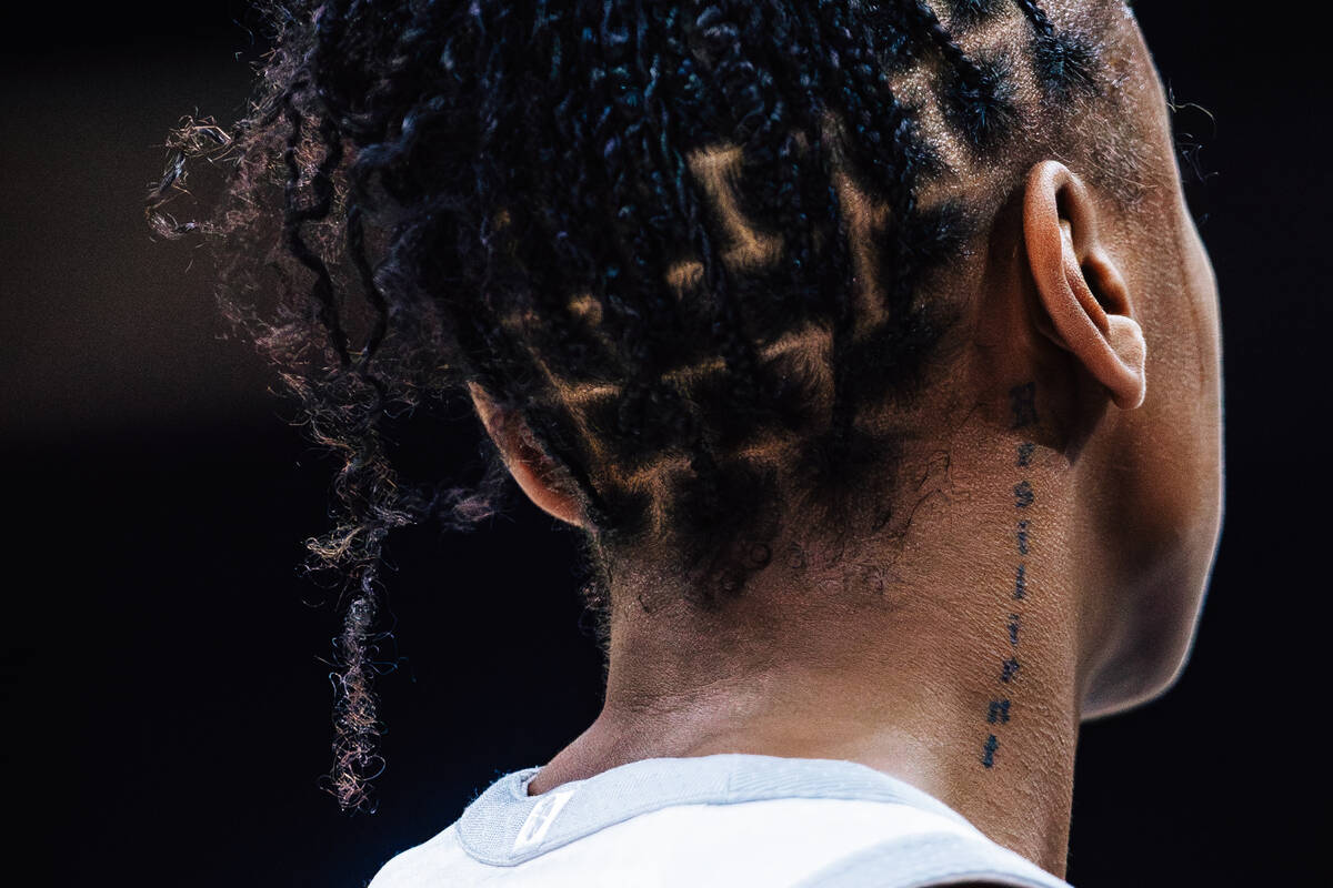 Aces guard Jewell Loyd’s neck tattoo during game three of a WNBA finals match up between ...