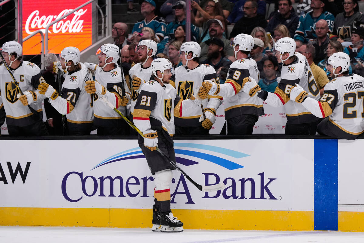 Vegas Golden Knights center Brett Howden (21) celebrates with teammates after scoring a goal du ...