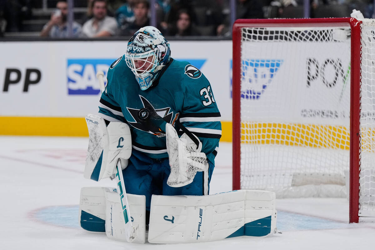 San Jose Sharks goaltender Alex Nedeljkovic stops a shot during the second period of an NHL hoc ...