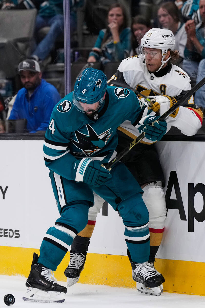 San Jose Sharks defenseman Nick Leddy, left, collides with Vegas Golden Knights center William ...