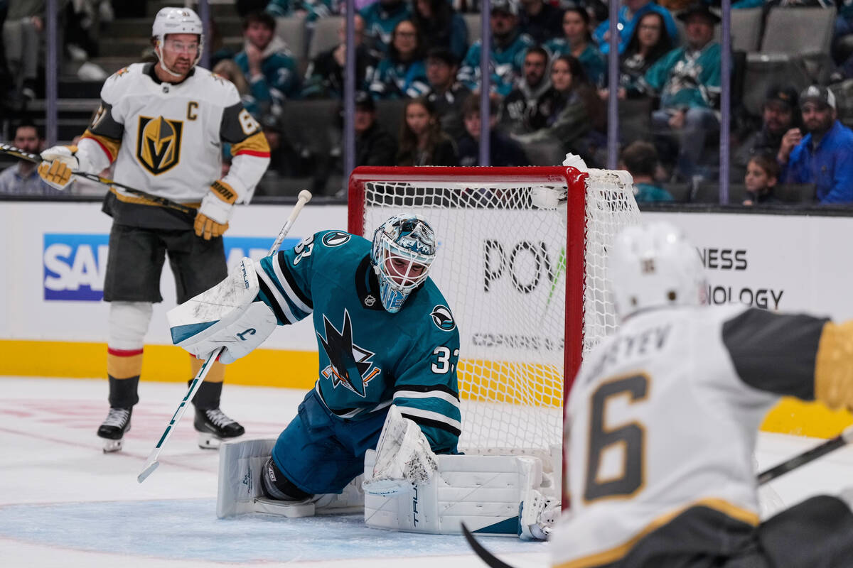 Vegas Golden Knights right wing Pavel Dorofeyev, foreground, scores a goal against San Jose Sha ...