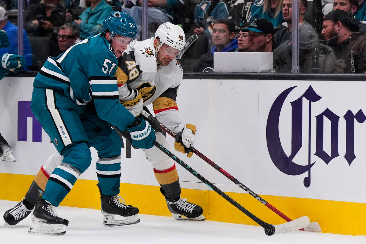 San Jose Sharks right wing Collin Graf (51) and Vegas Golden Knights center Tomas Hertl (48) co ...