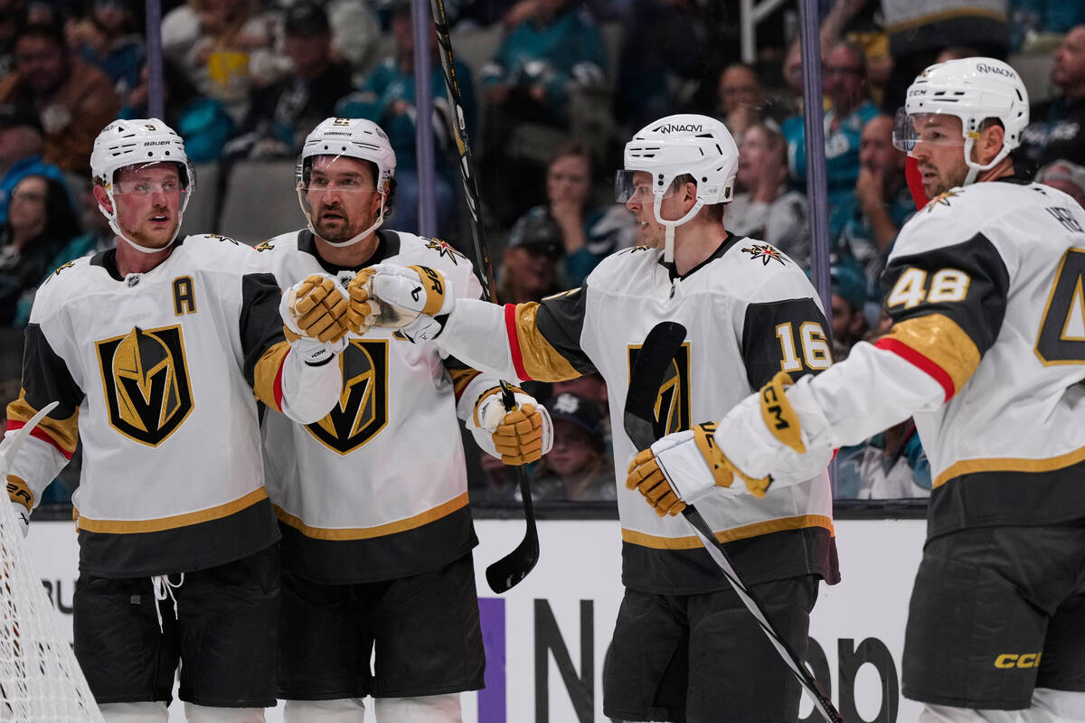 Vegas Golden Knights right wing Pavel Dorofeyev (16) celebrates with teammates after scoring a ...