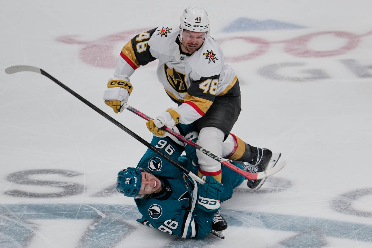 San Jose Sharks center Philipp Kurashev (96) collides with Vegas Golden Knights center Tomas He ...
