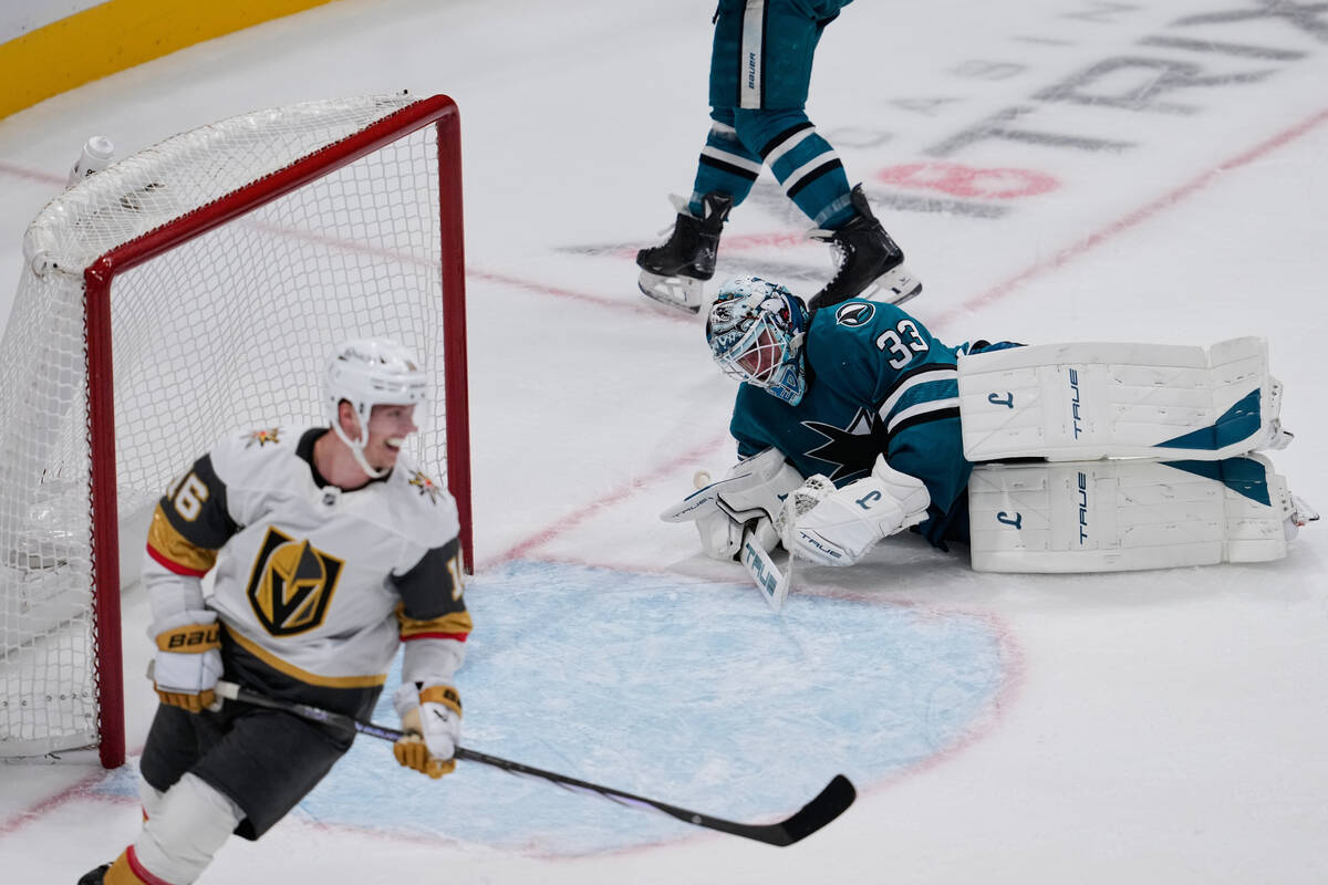 San Jose Sharks goaltender Alex Nedeljkovic (33) lays on the ice after Vegas Golden Knights cen ...