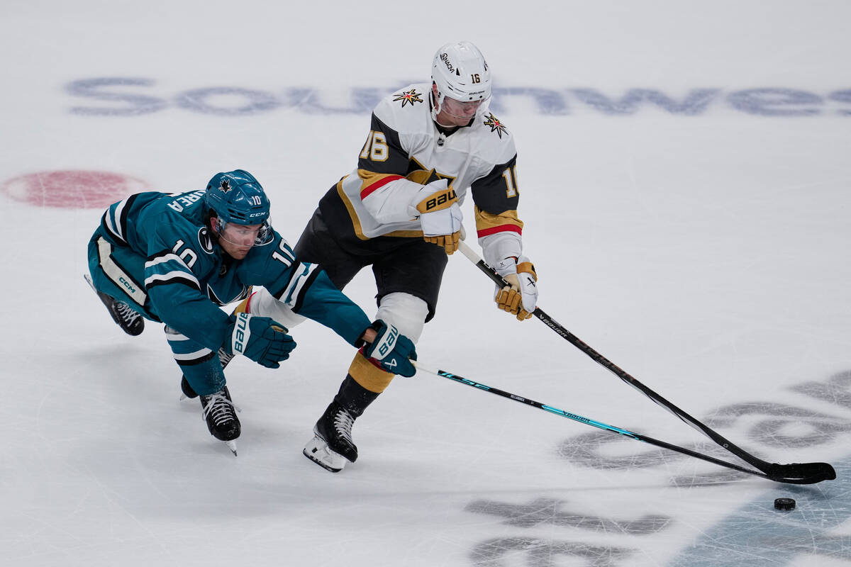 San Jose Sharks center Ty Dellandrea (10) and Vegas Golden Knights right wing Pavel Dorofeyev ( ...