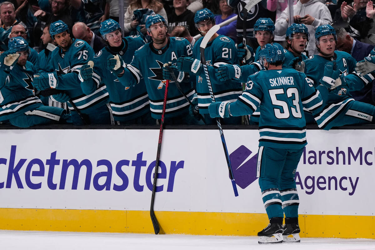 San Jose Sharks left wing Jeff Skinner (53) celebrates with teammates after scoring a goal duri ...