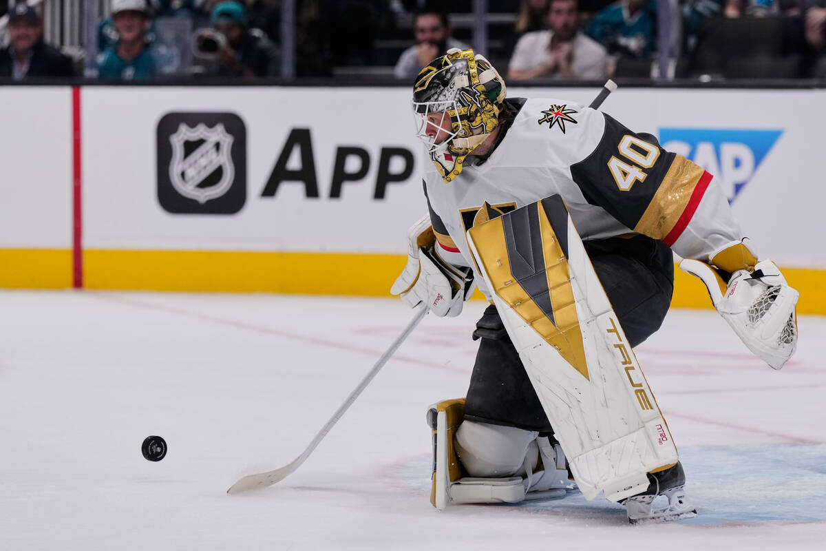 Vegas Golden Knights goaltender Akira Schmid (40) deflects a shot during the first period of an ...