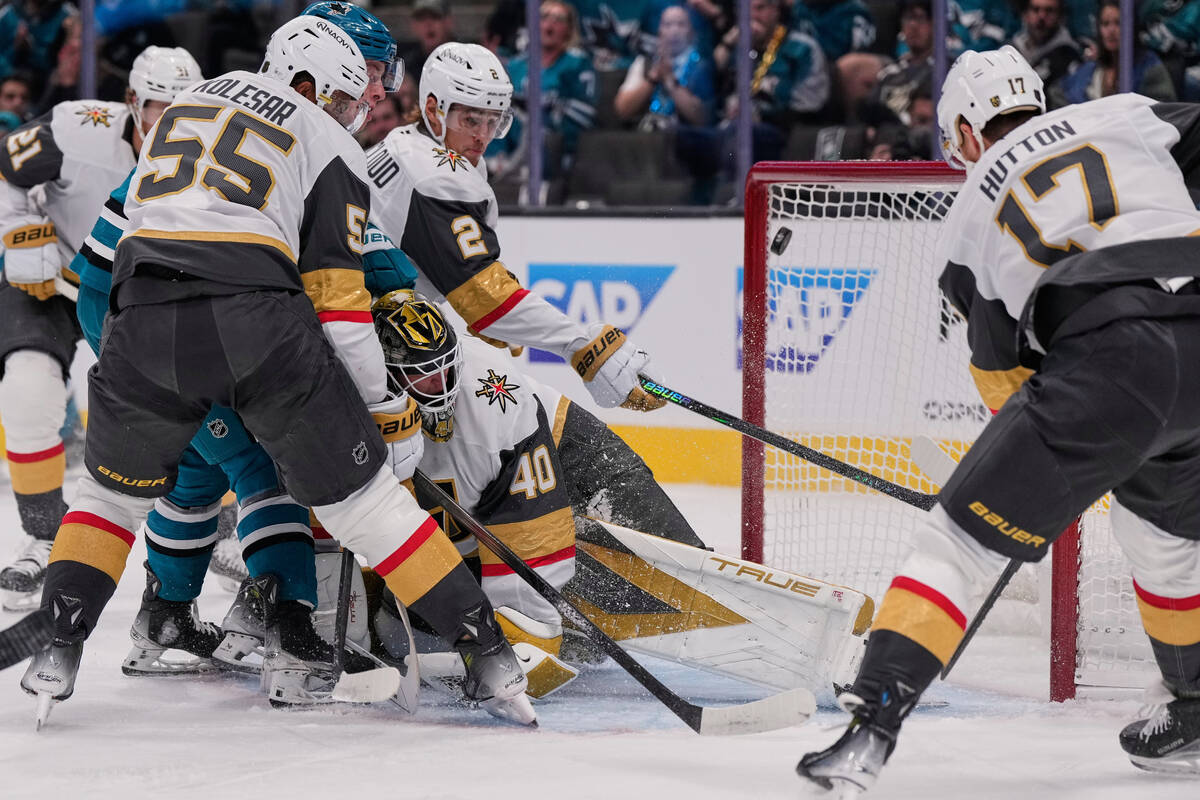 Vegas Golden Knights goaltender Akira Schmid (40) is unable to stop a goal by San Jose Sharks l ...