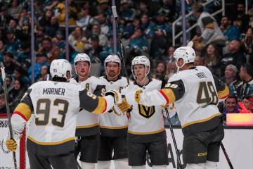 Vegas Golden Knights right wing Pavel Dorofeyev, second from right, celebrates with teammates a ...