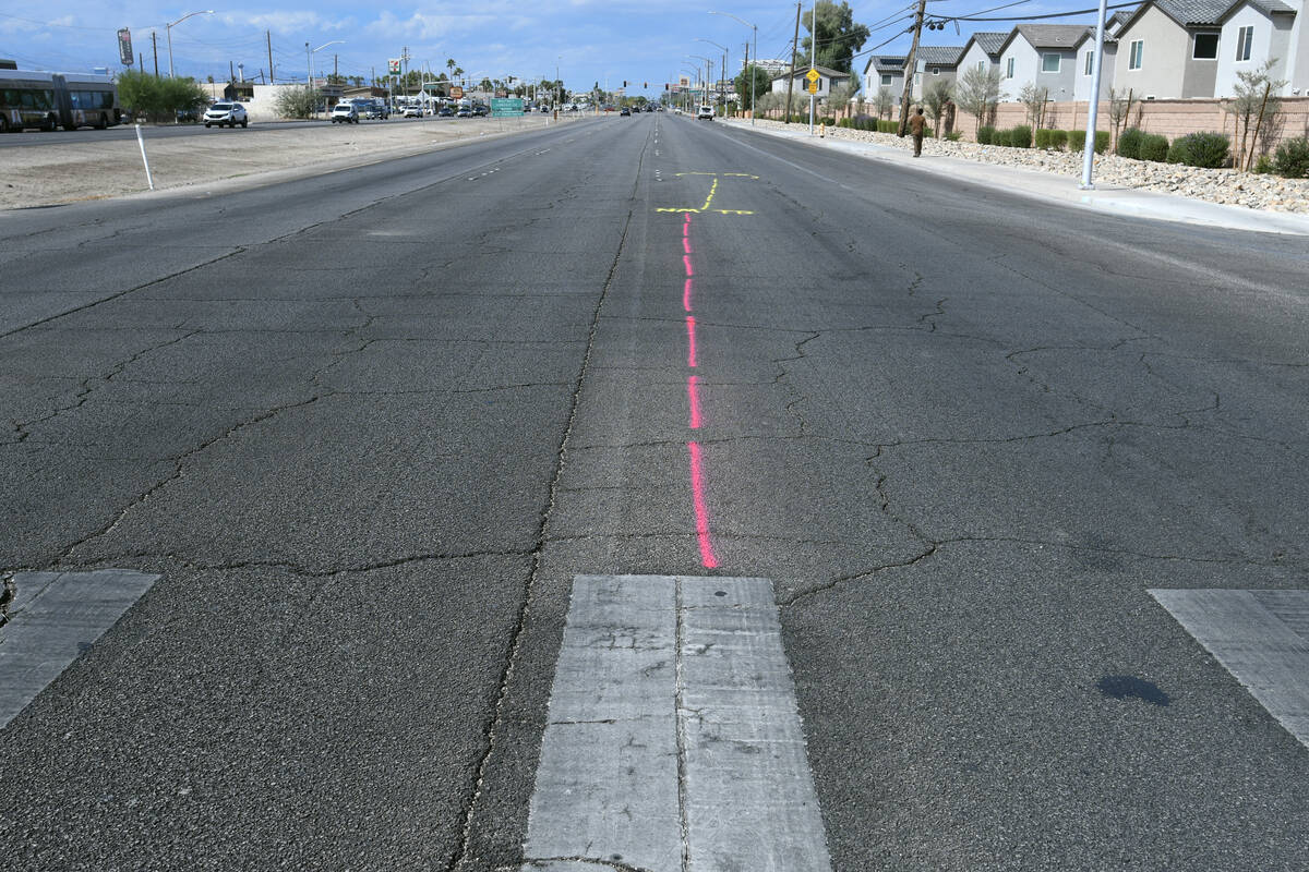 Spray paint marks the scene where a pedestrian was hit and killed in crosswalk on Boulder Highw ...