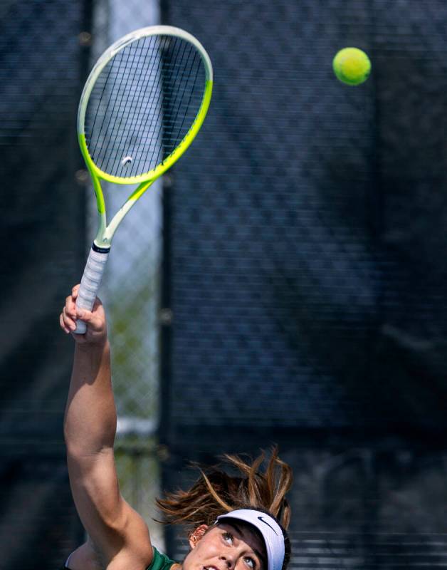 Palo Verde's Remi Rice serves the ball to a Coronado player in their singles match during ...