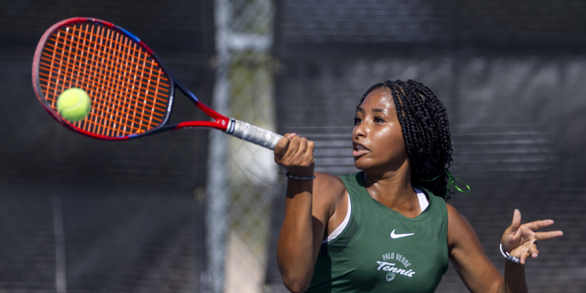 Palo Verde's Nicole Perrin returns the ball to a Coronado player in their singles match du ...