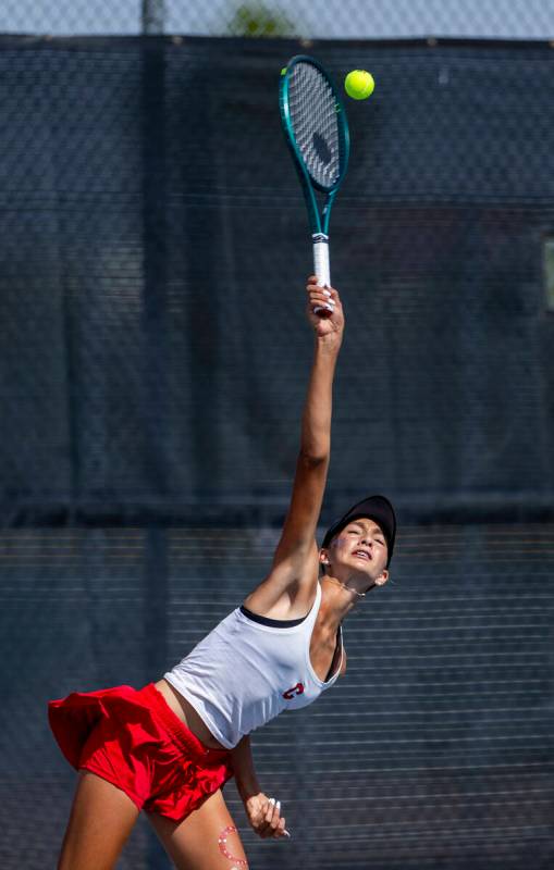 Coronado's Kamilah Saine serves the ball to a Palo Verde player in their singles match dur ...