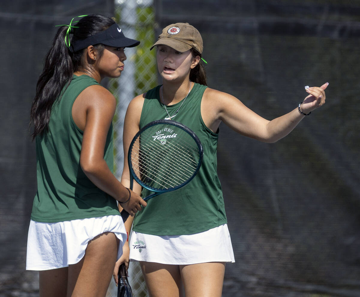 Palo Verde's Brooke Rivera and Elizabeth Gong chat in their double's match to Coronad ...