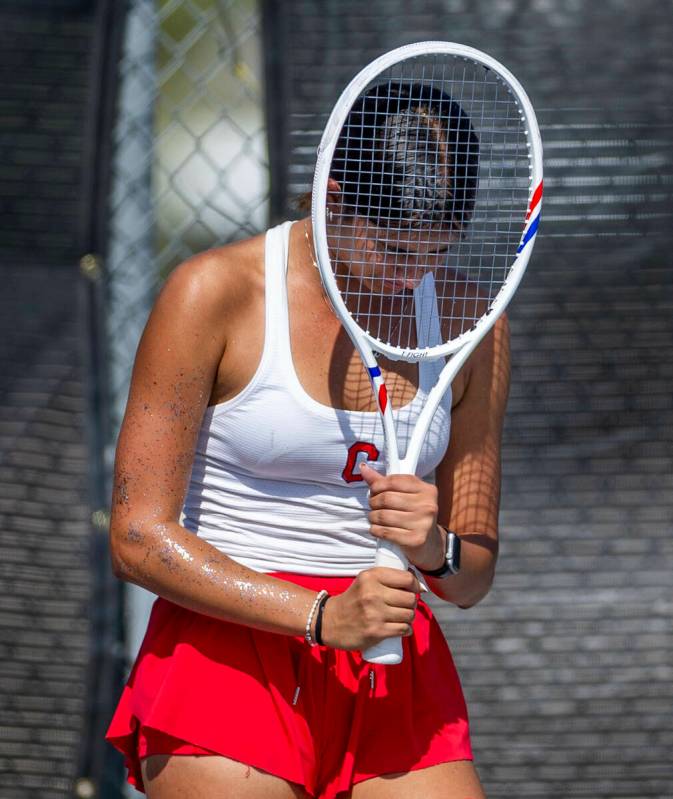 Coronado's Erika Gallegos hits her racket onto her head after a missed return to a Palo Ve ...
