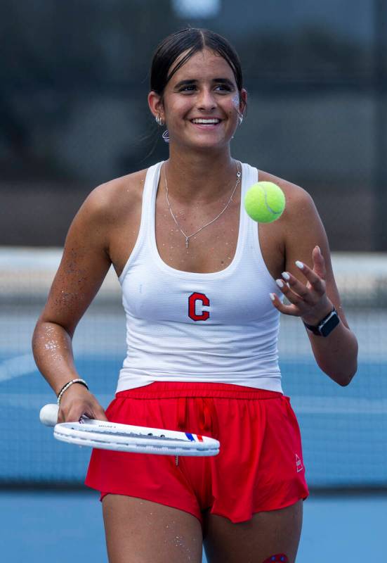 Coronado's Erika Gallegos smiles after defeating a Palo Verde player in their singles matc ...