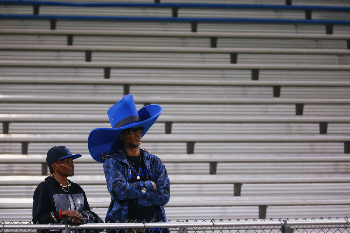 Fans watch Desert Pines warm up before a football game on Friday, Oct. 10, 2025 at Desert Pines ...