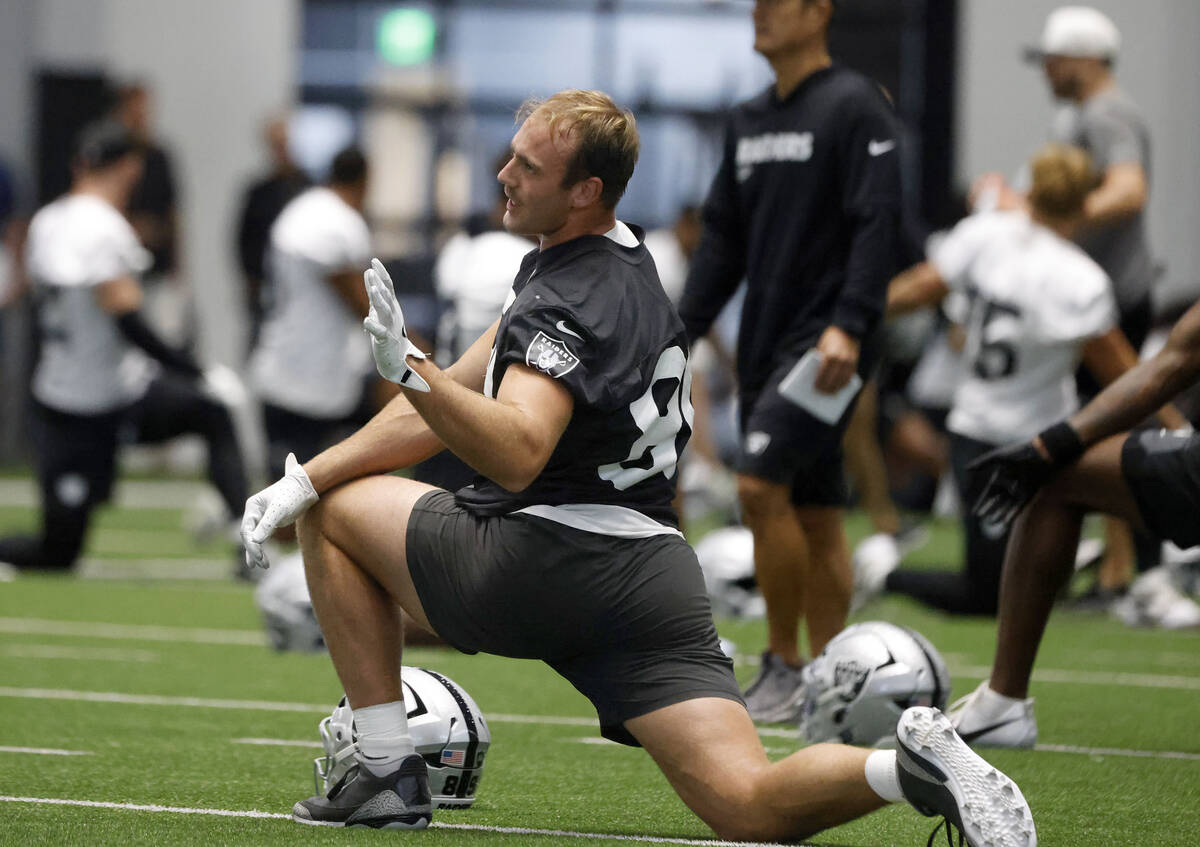 Raiders tight end Brock Bowers (89) stretches during training camp at the Intermountain Health ...