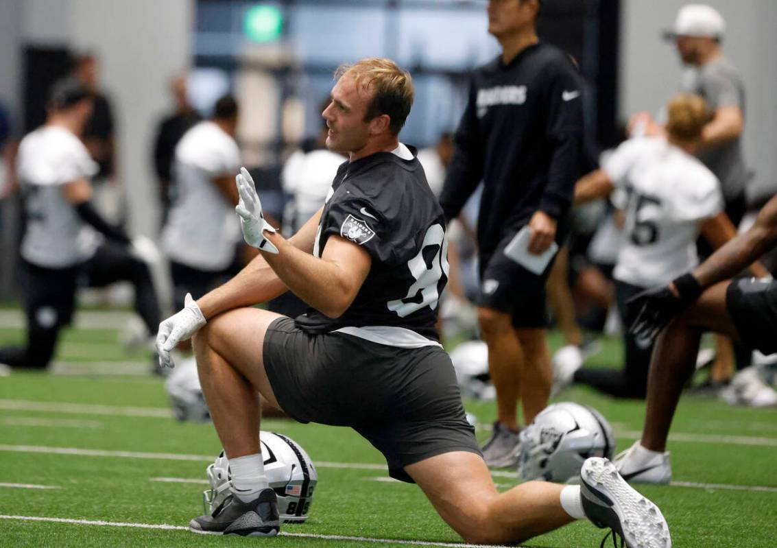 Raiders tight end Brock Bowers (89) stretches during training camp at the Intermountain Health ...