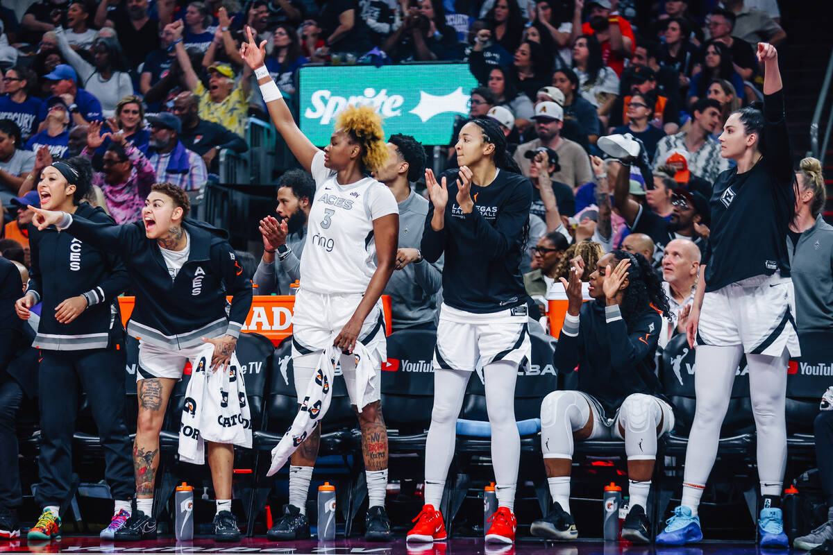 The Aces cheer from the bench for their teammates during game four of a WNBA finals match up be ...