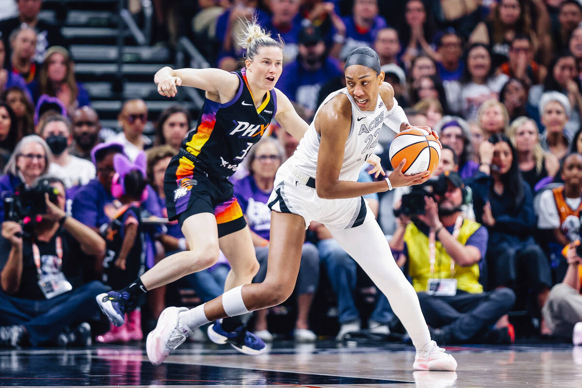 Aces center A'ja Wilson (22) drives the ball during game four of a WNBA finals match up be ...