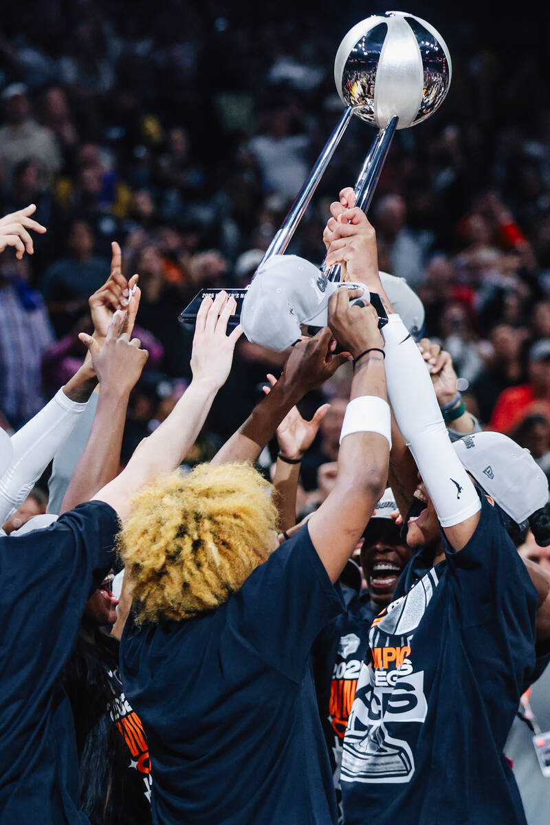 The Aces celebrate winning the WNBA championship during game four of a WNBA finals match up aga ...