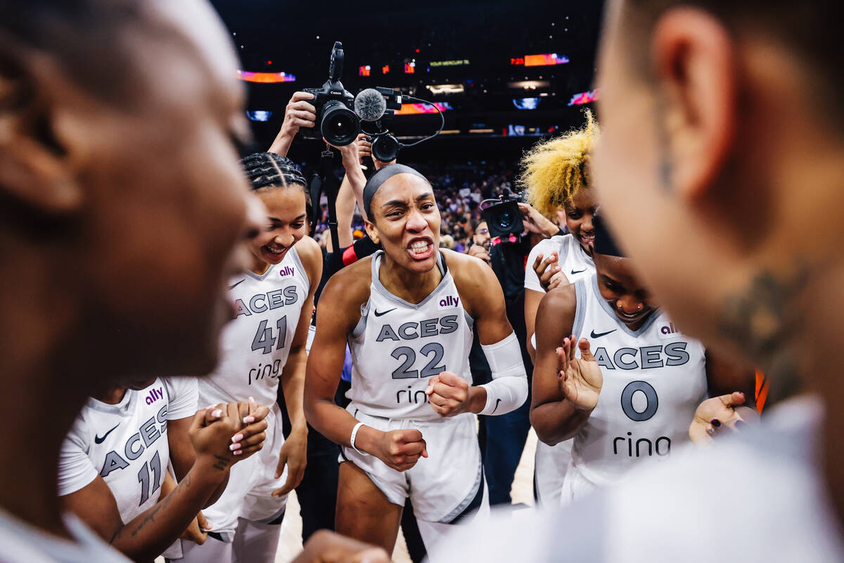 Aces center A'ja Wilson (22) rallies her team after winning the WNBA championship during g ...