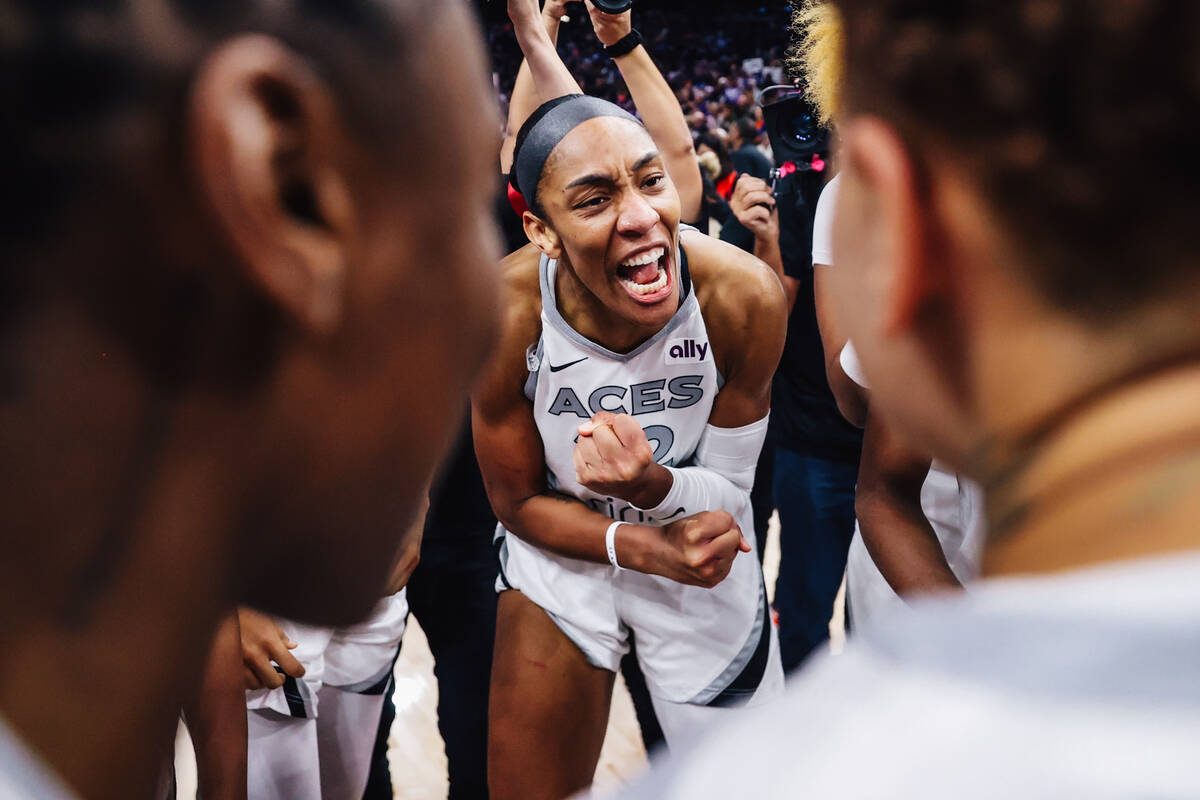 Aces center A'ja Wilson (22) rallies her team after winning the WNBA championship followin ...