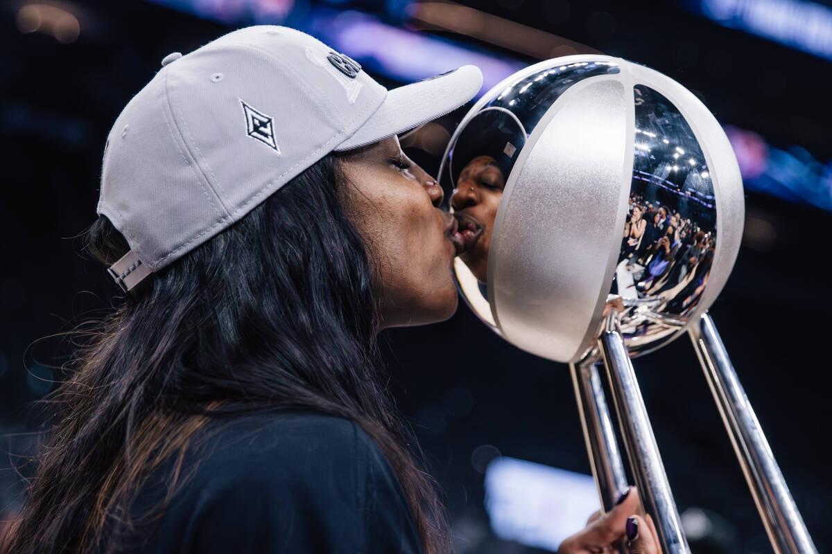 Aces guard Jackie Young celebrates winning the WNBA championship following game four of a WNBA ...