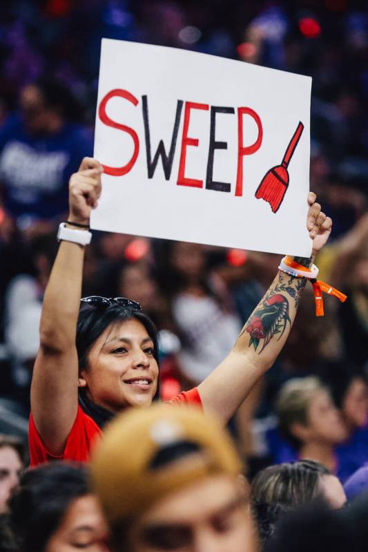 An Aces fan holds up a sign during game four of a WNBA finals match up between the Aces and Pho ...
