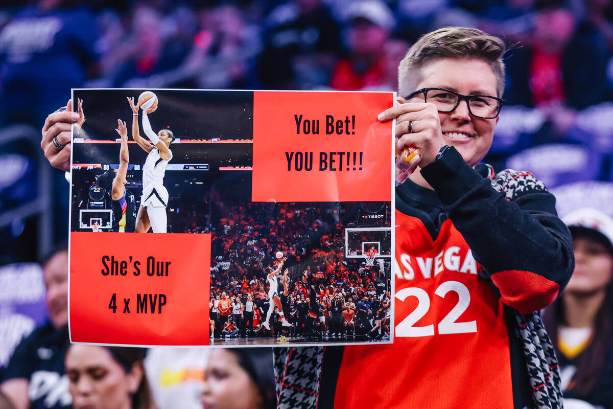 An Aces fan holds up a sign during game four of a WNBA finals match up between the Aces and Pho ...