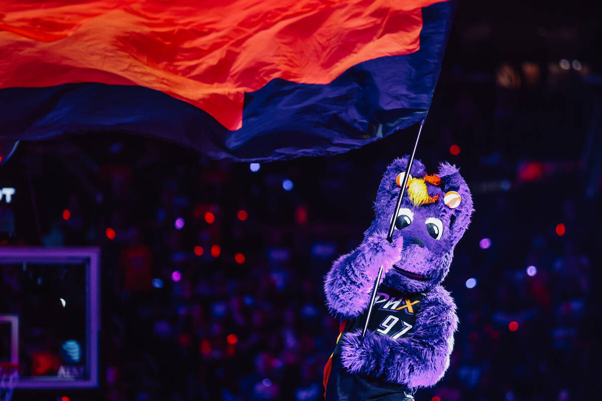 Phoenix Mercury mascot Scorch waves a flag during game four of a WNBA finals match up between t ...