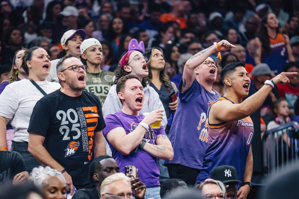 Phoenix Mercury fans boo the referees during game four of a WNBA finals match up between the Ac ...