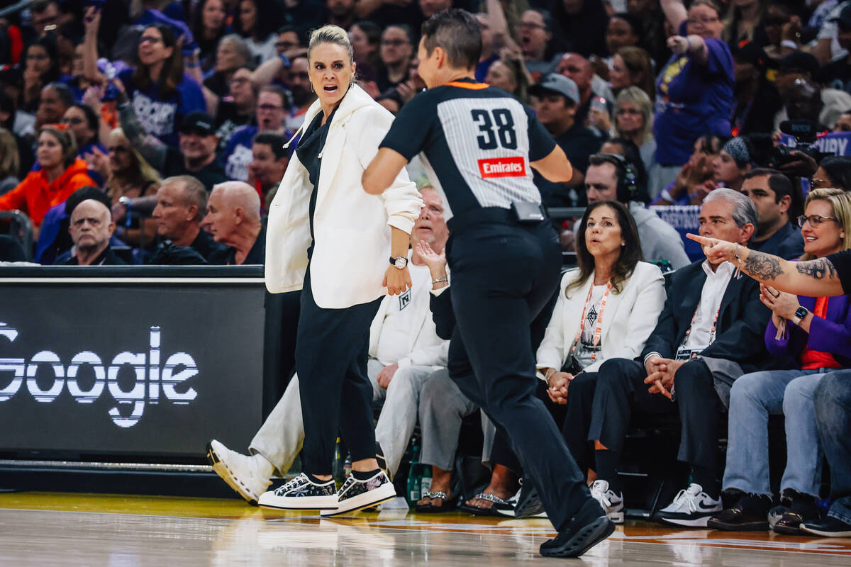 Aces head coach Becky Hammon yells at a referee during game four of a WNBA finals match up betw ...