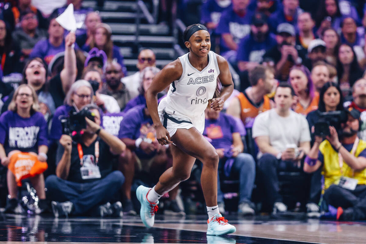 Aces guard Jackie Young (0) runs across the court during game four of a WNBA finals match up be ...