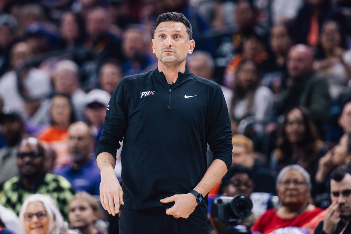 Phoenix Mercury head coach Nate Tibbetts watches game play during game four of a WNBA finals ma ...