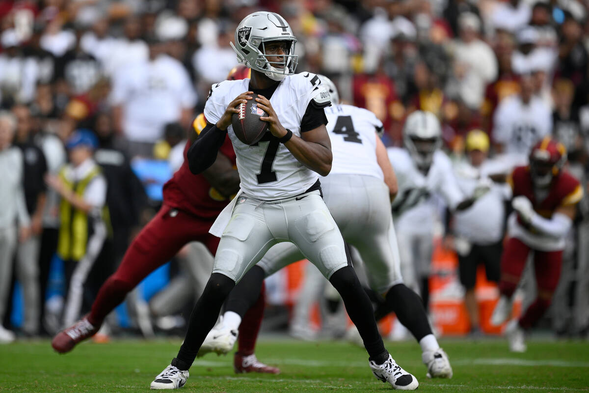 Las Vegas Raiders quarterback Geno Smith (7) in action during the first half of an NFL football ...