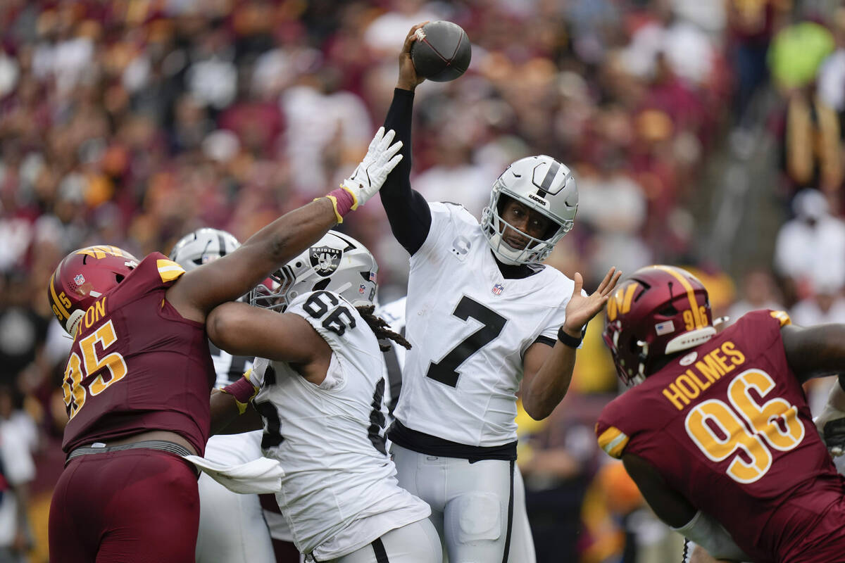 Las Vegas Raiders quarterback Geno Smith (7) throws during the first half of NFL football game ...