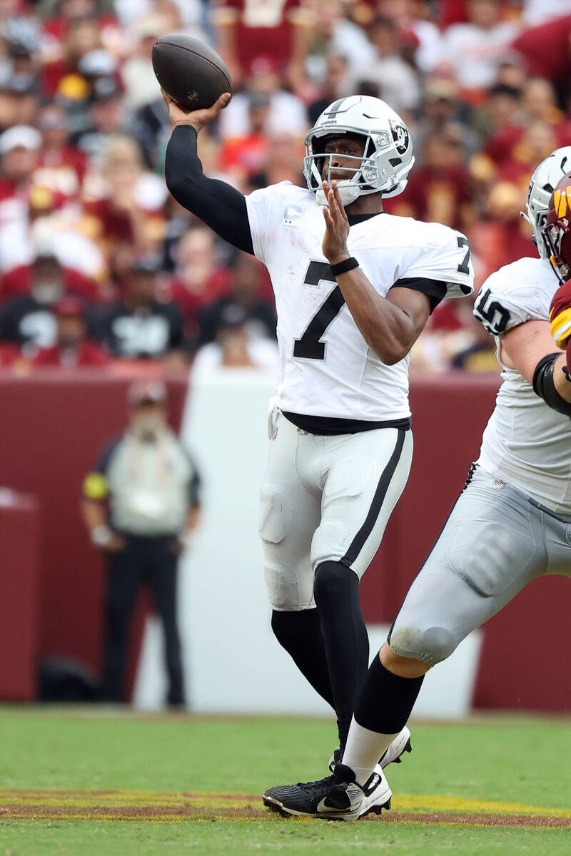 Las Vegas Raiders quarterback Geno Smith (7) throws the ball during an NFL football game agains ...