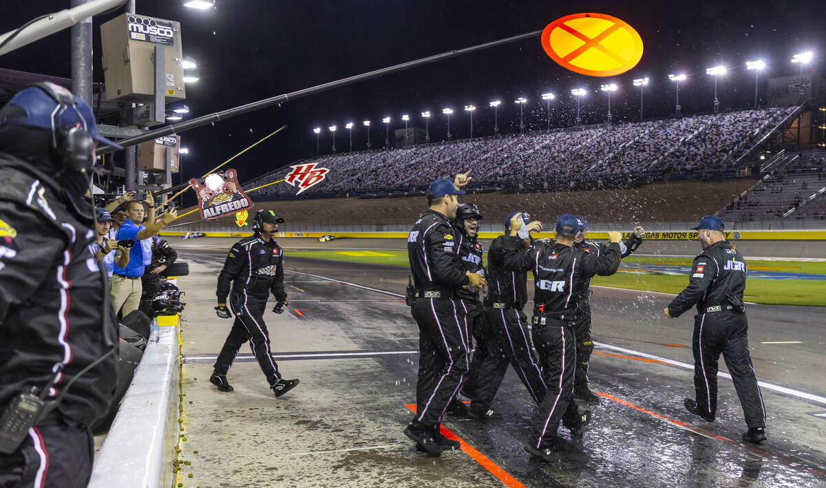 The pit crew for driver Aric Almirola (19) celebrates the win during the Focused Health 302 NXS ...