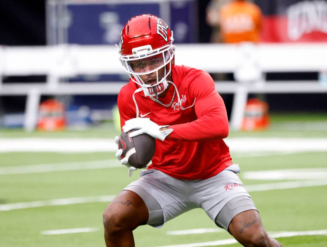 UNLV wide receiver Koy Moore (5) catches a pass befor an NCAA football game against Air Force F ...