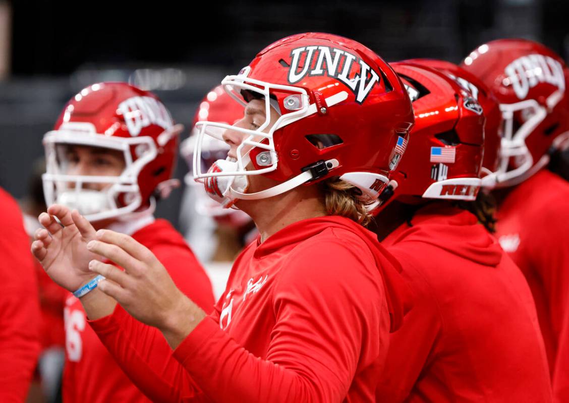 UNLV quarterback Anthony Colandrea (10) and his teammates take the field as they prepare to fac ...
