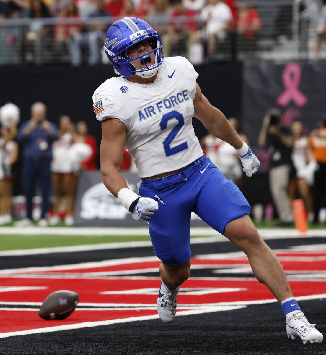 Air Force Falcons running back Owen Allen (2) celebrates his touchdown against UNLV during the ...