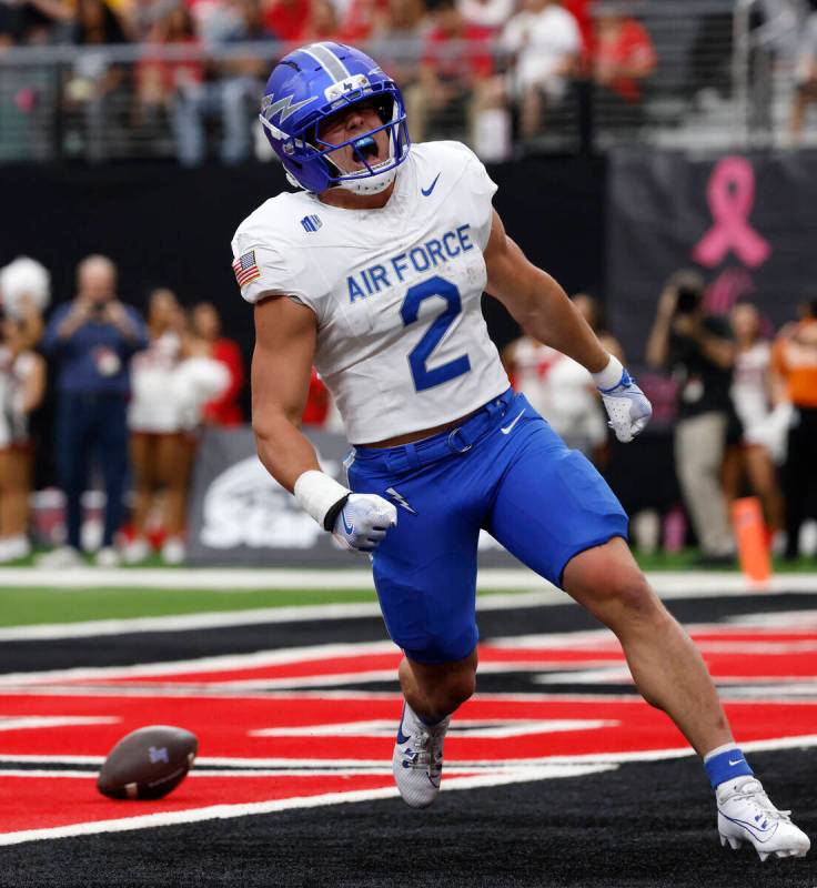 Air Force Falcons running back Owen Allen (2) celebrates his touchdown against UNLV during the ...